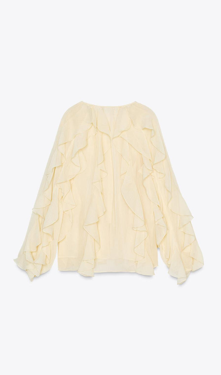 BLUSA CON VOLANTES