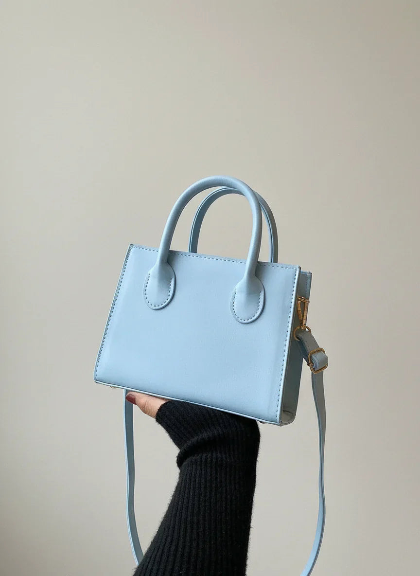Victoria™ | Mini saco tote estruturado e minimalista