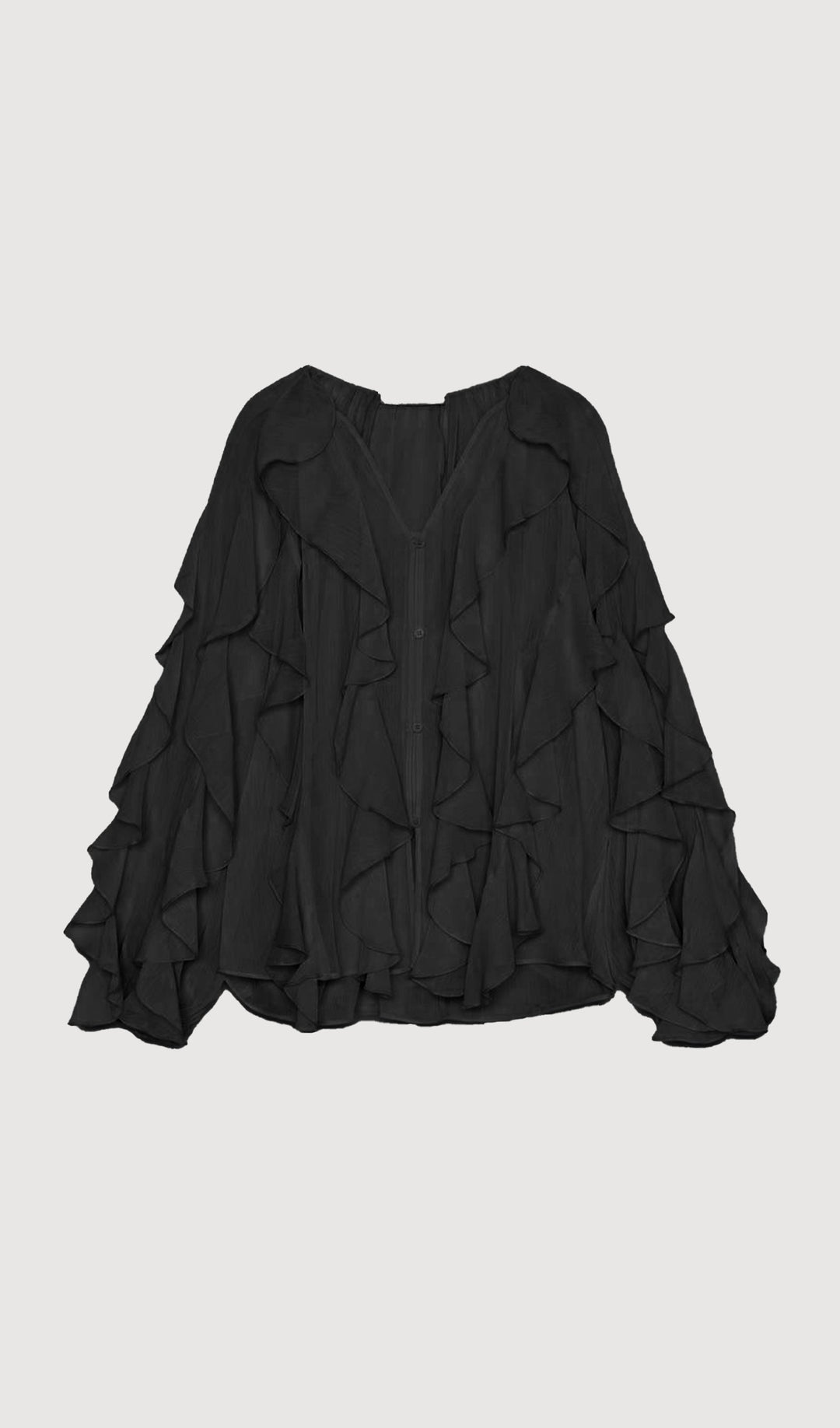 BLUSA CON VOLANTES