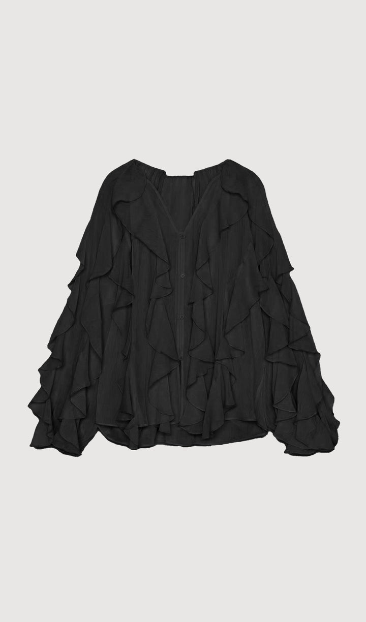 BLUSA CON VOLANTES