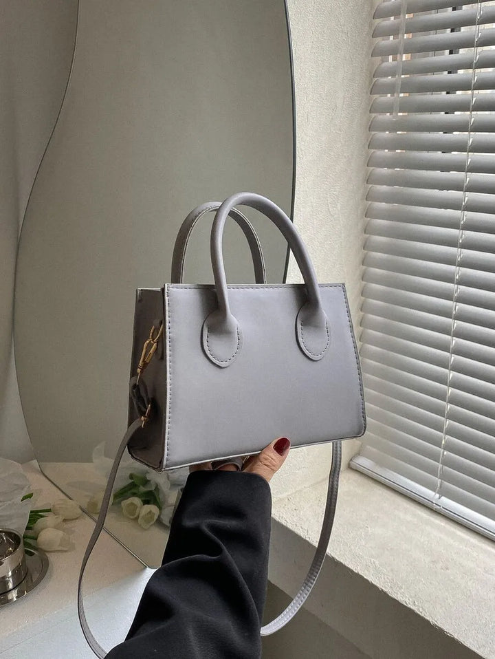 Victoria™ | Mini saco tote estruturado e minimalista